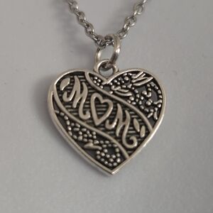 Elegant Silvertone Heart Pendant Necklace